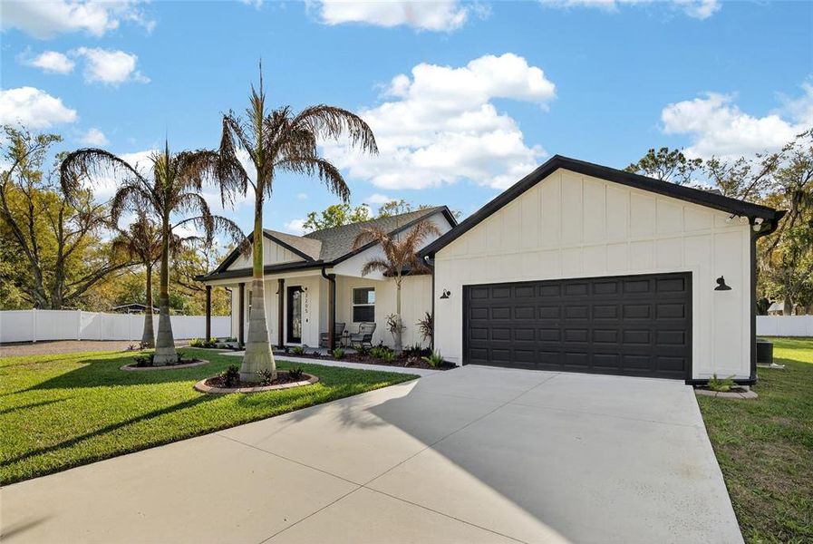 Front exterior of a new home in , Plant City, FL, highlighting curb appeal (Image 23).