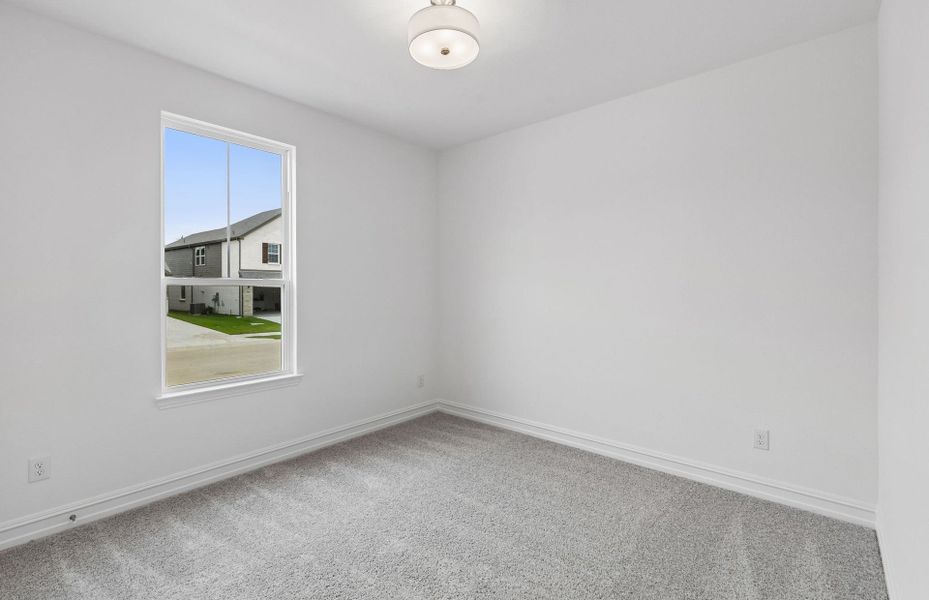 Spacious, unfurnished interior of a new home in Rosemary Fields, Godley (Image 12).