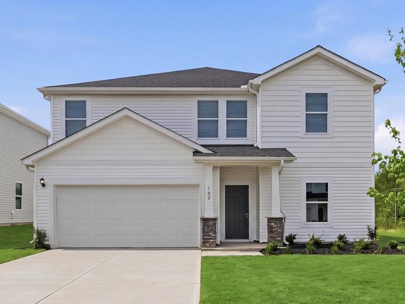 Front exterior of a new home in The Farm at Wells Creek - Signature Collection, Gray Court, SC, highlighting curb appeal (Image 1). Front exterior of a new home in The Farm at Wells Creek - Signature Collection, Gray Court, SC, highlighting curb appeal (Image 1).