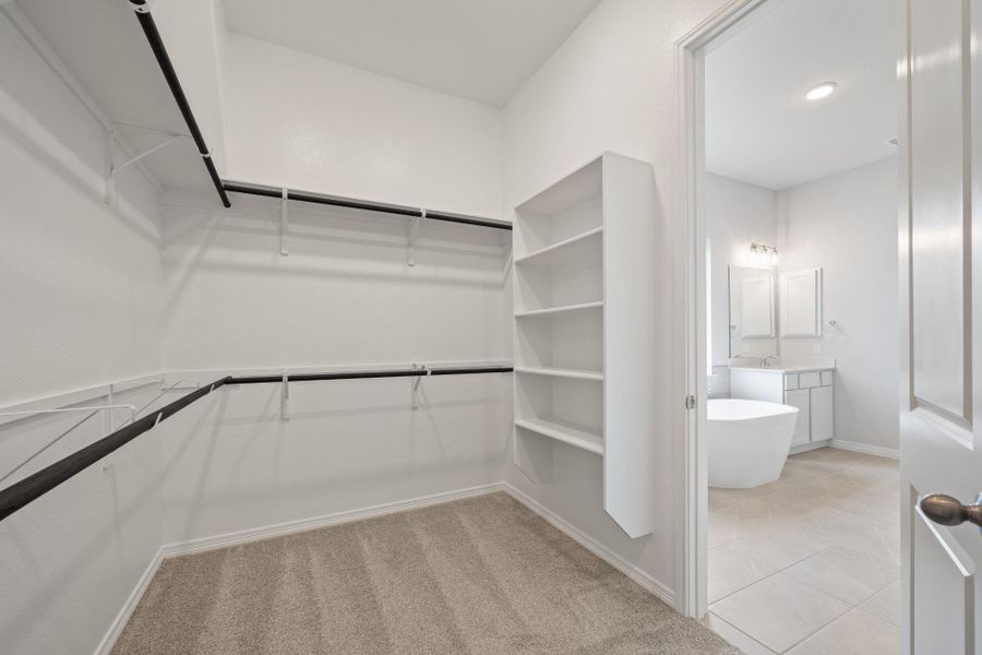 Walk-in closet in Primary Bedroom