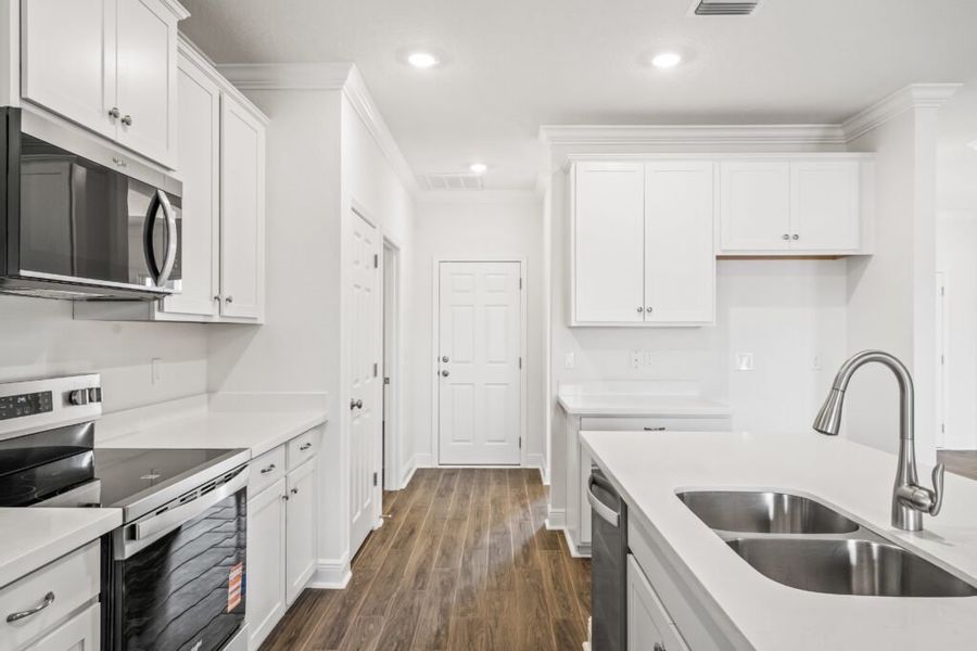 Furnished interior view inside a new home in Natureview, Freeport (Image 7).