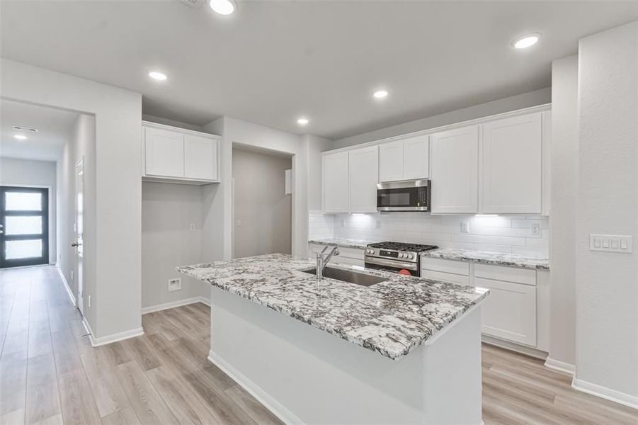 Furnished interior view inside a new home in Lakes at Black Oak, Magnolia (Image 36).