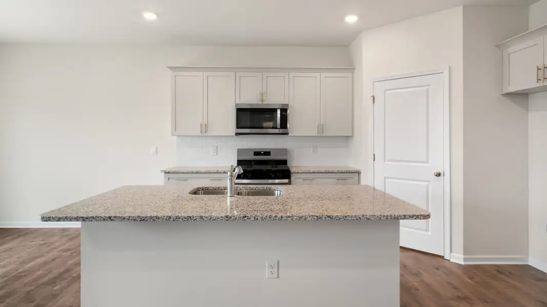 Furnished interior view inside a new home in The Reserve at Prestleigh, Wake Forest (Image 4).
