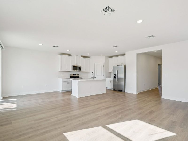 Spacious, unfurnished interior of a new home in The Reserve at Hammock Oaks - Signature Series, Lady Lake (Image 12).