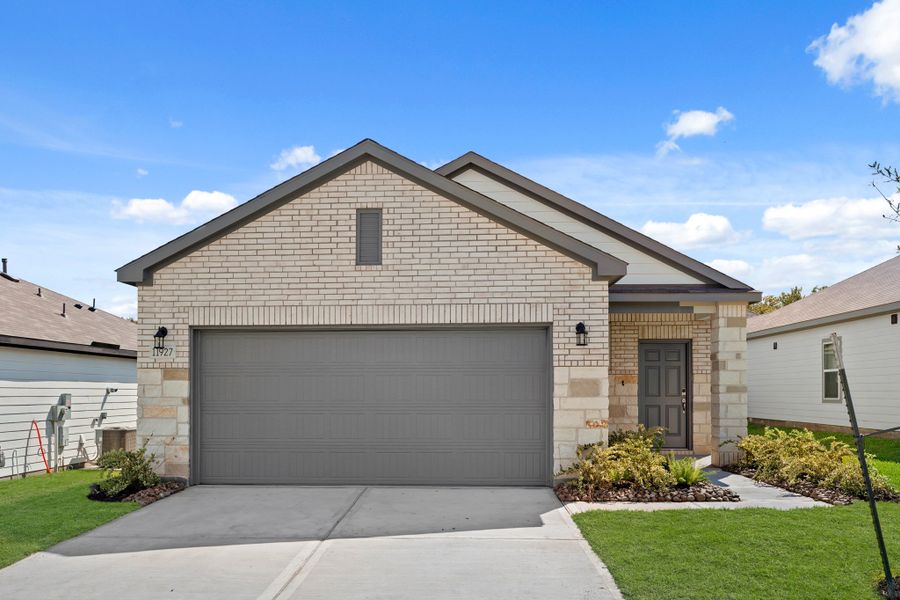 Front exterior of a new home in Lexington Heights, Willis, TX, highlighting curb appeal (Image 1). Front exterior of a new home in Lexington Heights, Willis, TX, highlighting curb appeal (Image 1).