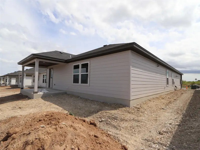 Exterior details and patio area of a home in Marble Creek Crossing, Austin (Image 10). Exterior details and patio area of a home in Marble Creek Crossing, Austin (Image 10).