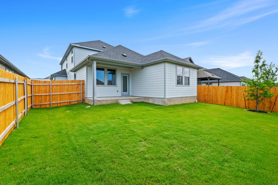 Exterior details and patio area of a home in Prairie Winds, Hutto (Image 25).