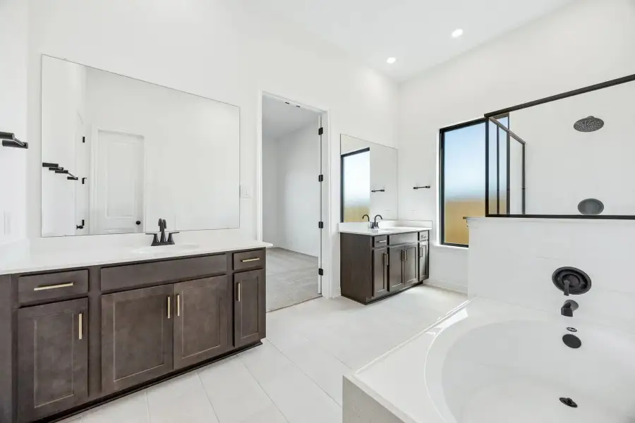 Primary bathroom. Sample product photo. Actual exterior and interior selections may vary by homesite. Photo may be virtually staged.