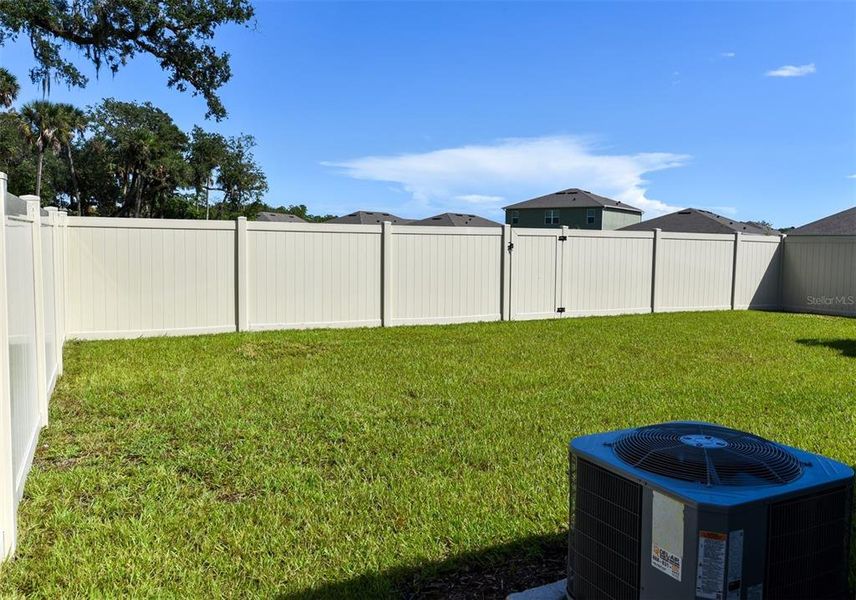 Exterior details and patio area of a home in Oak Leaf Preserve, New Smyrna Beach (Image 4). Exterior details and patio area of a home in Oak Leaf Preserve, New Smyrna Beach (Image 4).