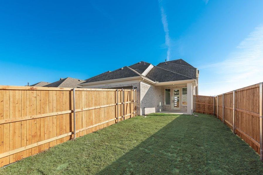 Exterior details and patio area of a home in Trails at Cottonwood Creek, Rowlett (Image 3).