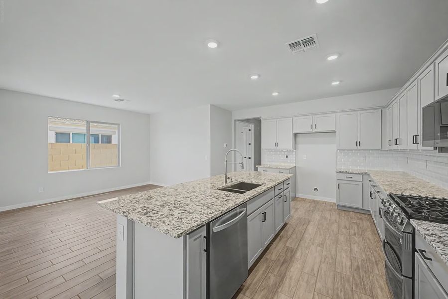 Furnished interior view inside a new home in Avanti at Granite Vista, Waddell (Image 6).