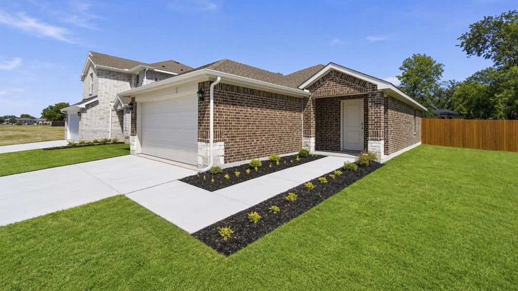 Front exterior of a new home in Asher Oaks, Bonham, TX, highlighting curb appeal (Image 1). Front exterior of a new home in Asher Oaks, Bonham, TX, highlighting curb appeal (Image 1).