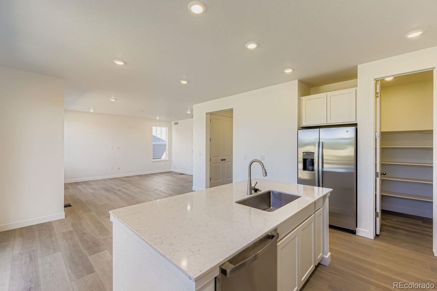 Furnished interior view inside a new home in Vermilion Creek: The Pioneer Collection, Centennial (Image 5).