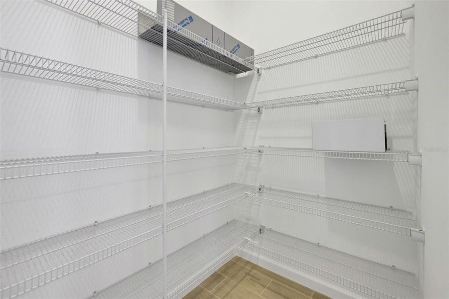 Spacious, unfurnished interior of a new home in Serenade at Ovation, Winter Garden (Image 35).