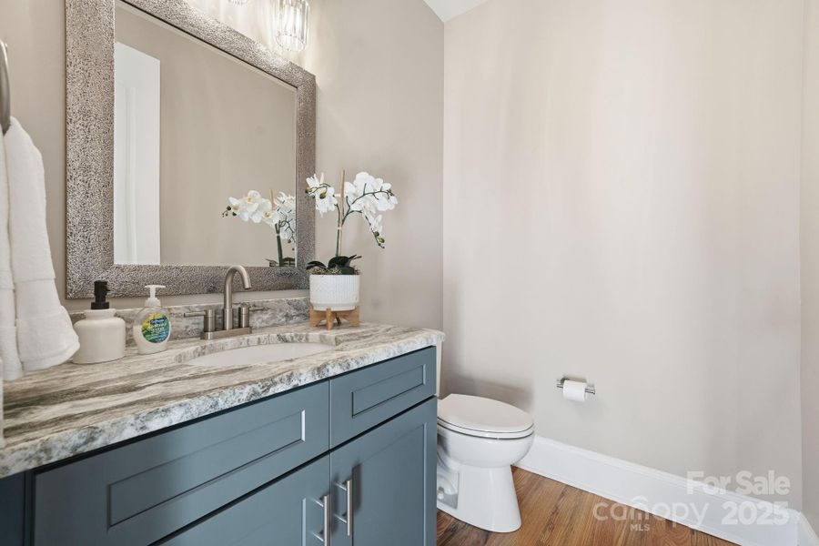 Stylish powder room, perfect for guests and entertaining. Stylish powder room, perfect for guests and entertaining.