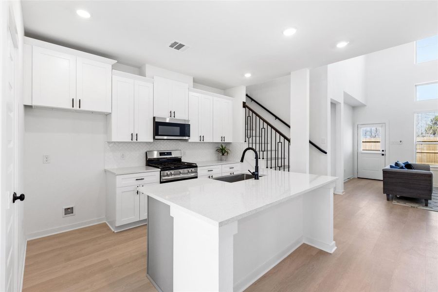 Furnished interior view inside a new home in Kendall Lakes, Alvin (Image 16).