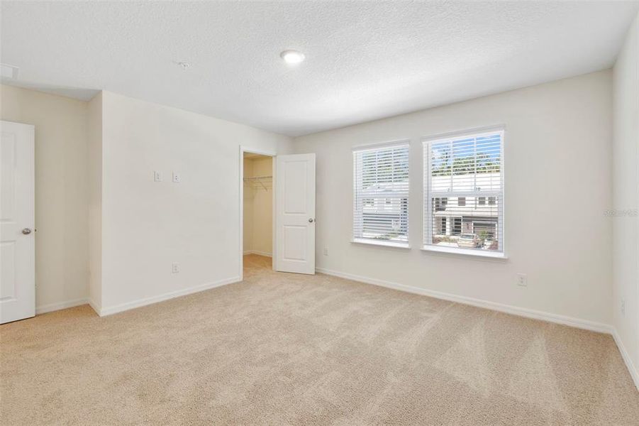 Spacious, unfurnished interior of a new home in Towns at Riverwalk, Sanford (Image 13).