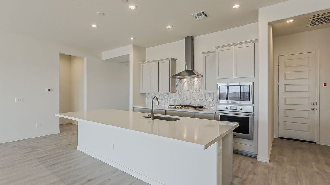 Furnished interior view inside a new home in Windrose, Waddell (Image 10).