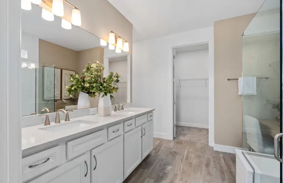 Furnished interior view inside a new home in Del Webb Sunbridge, St. Cloud (Image 7).