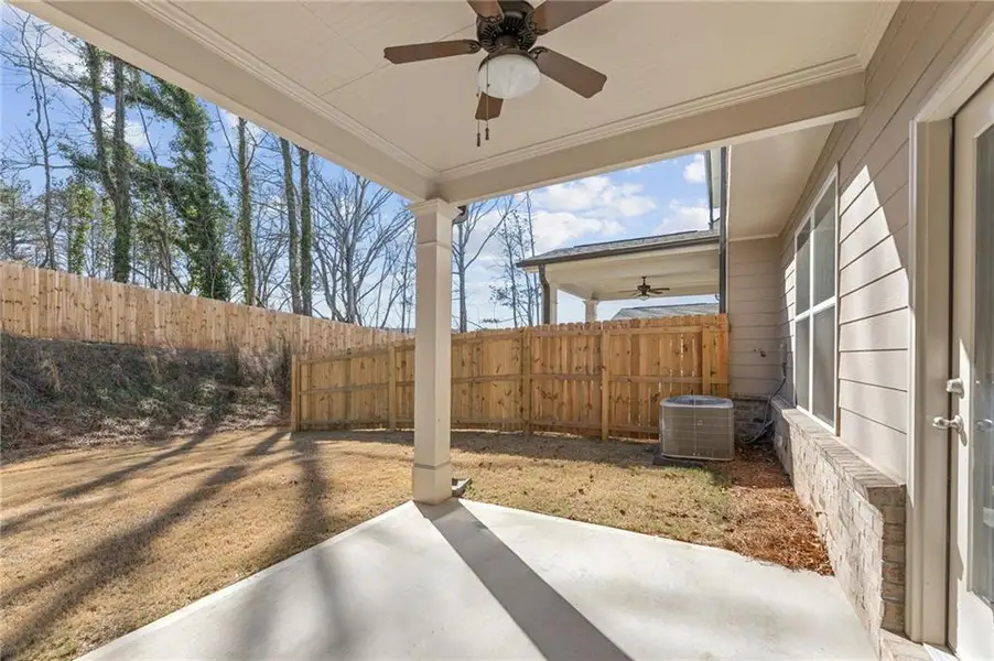 Exterior details and patio area of a home in Mulberry Summit, Flowery Branch (Image 2). Exterior details and patio area of a home in Mulberry Summit, Flowery Branch (Image 2).