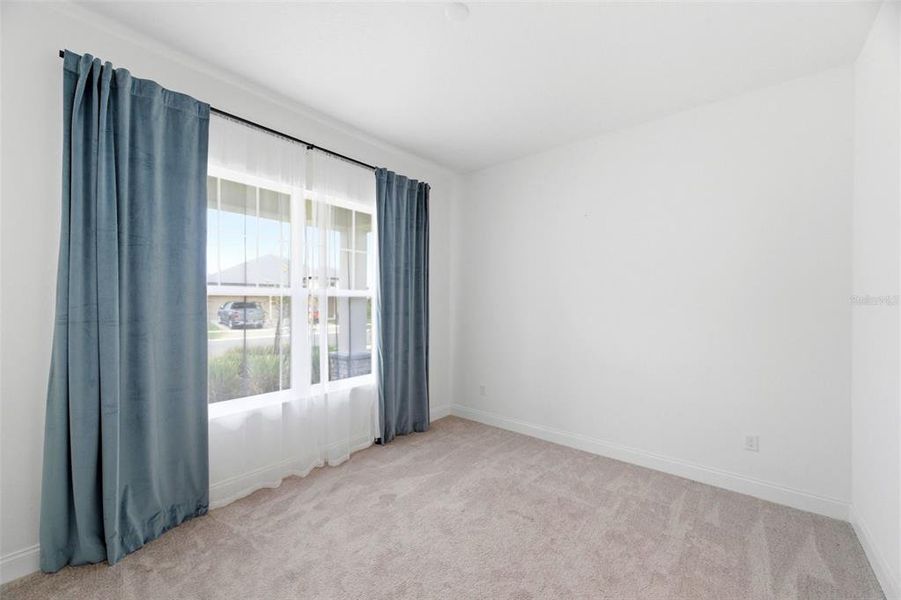 Spacious, unfurnished interior of a new home in Tamarack at Two Rivers, Zephyrhills (Image 41).