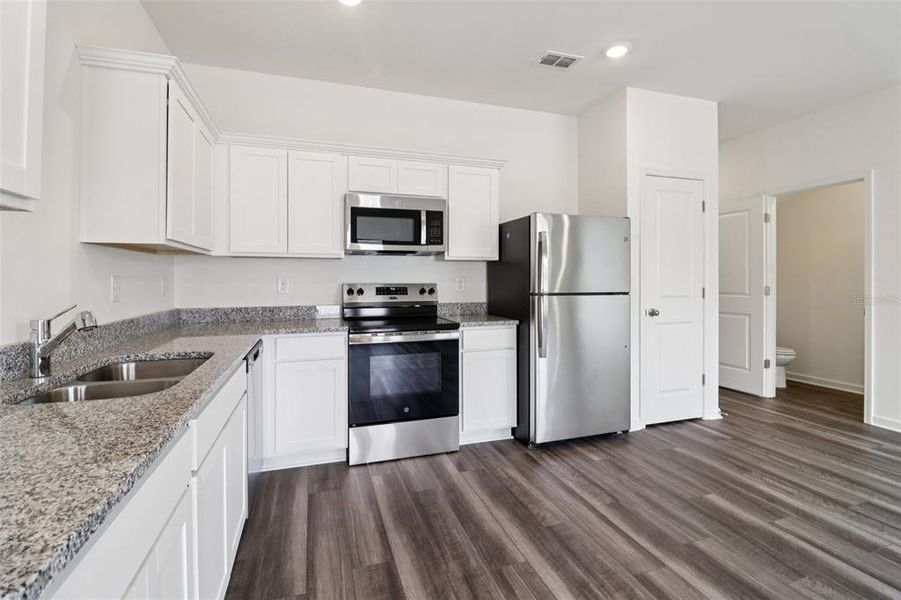 Furnished interior view inside a new home in Temples Crossing, Davenport (Image 11).