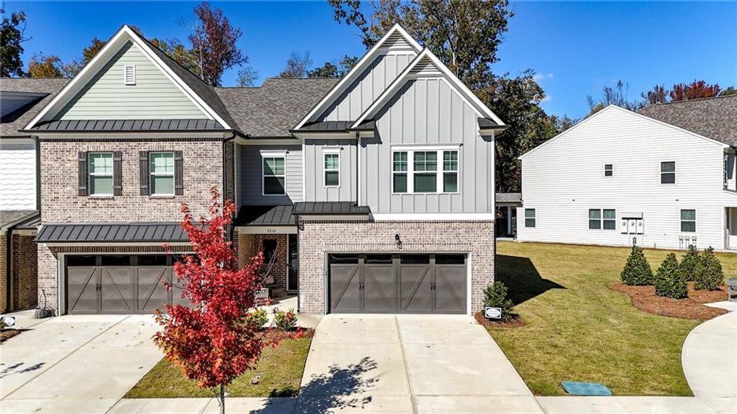 Front exterior of a new home in , Flowery Branch, GA, highlighting curb appeal (Image 24).