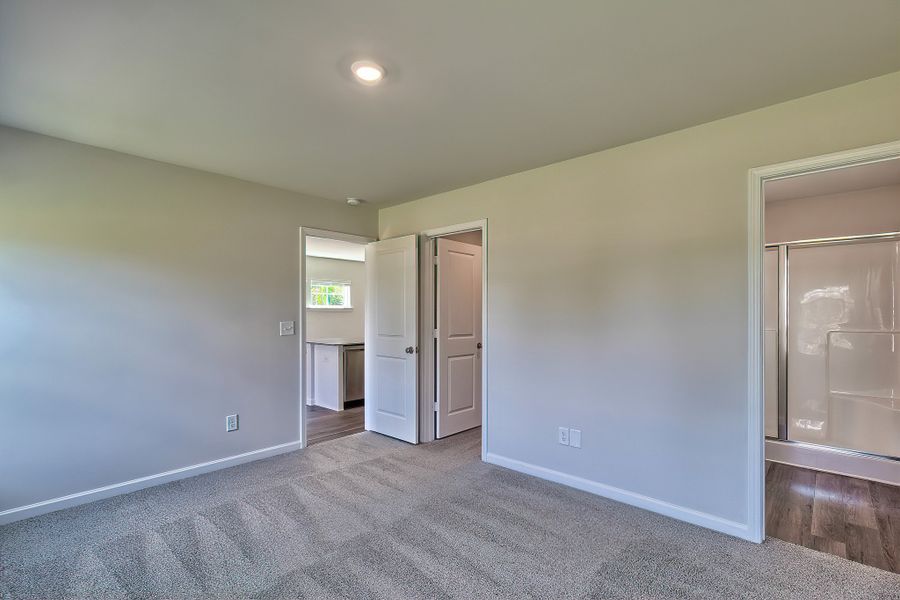 Representative unfurnished interior of a home built from the Juniper by McGuinn Homes in Hunters Branch, Hopkins (Image 14).