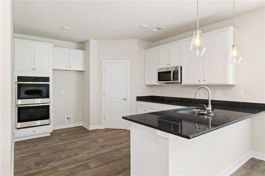 Furnished interior view inside a new home in Fern Dale, Fairburn (Image 5).