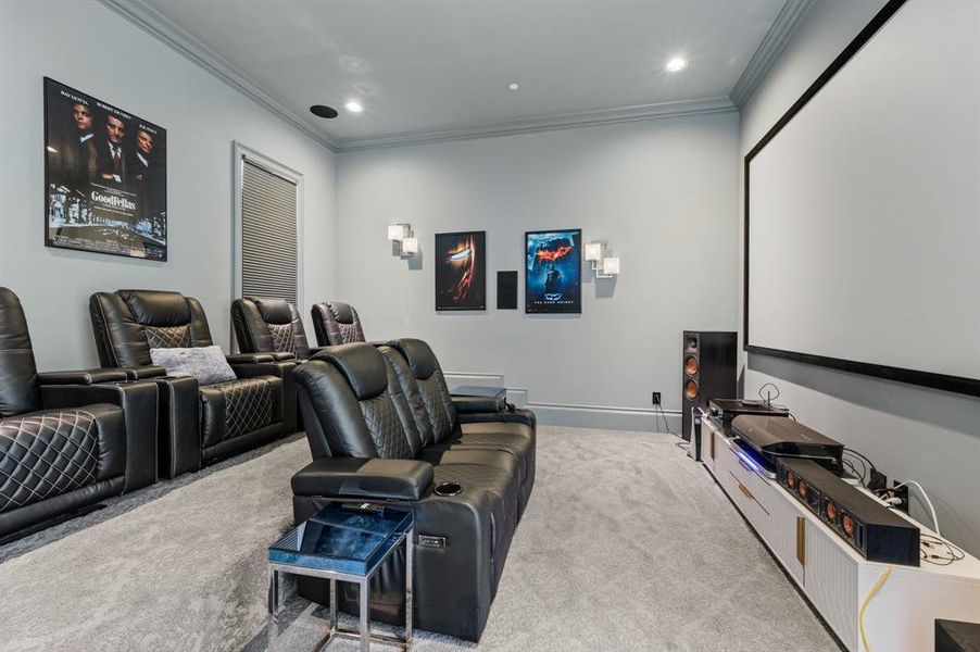 Cinema featuring carpet flooring, crown molding, and recessed lighting Cinema featuring carpet flooring, crown molding, and recessed lighting