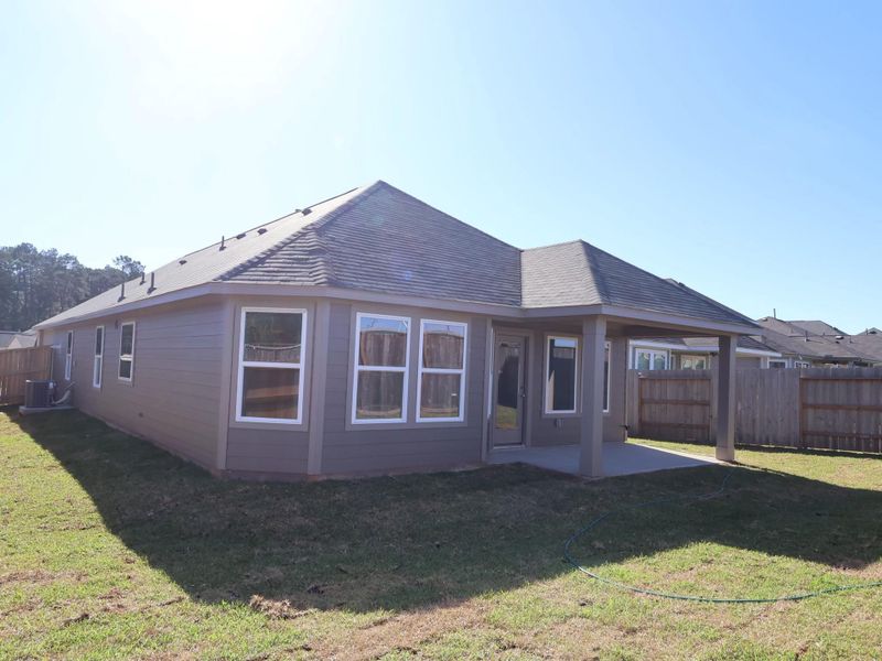Exterior details and patio area of a home in Lone Star Landing, Montgomery (Image 3).