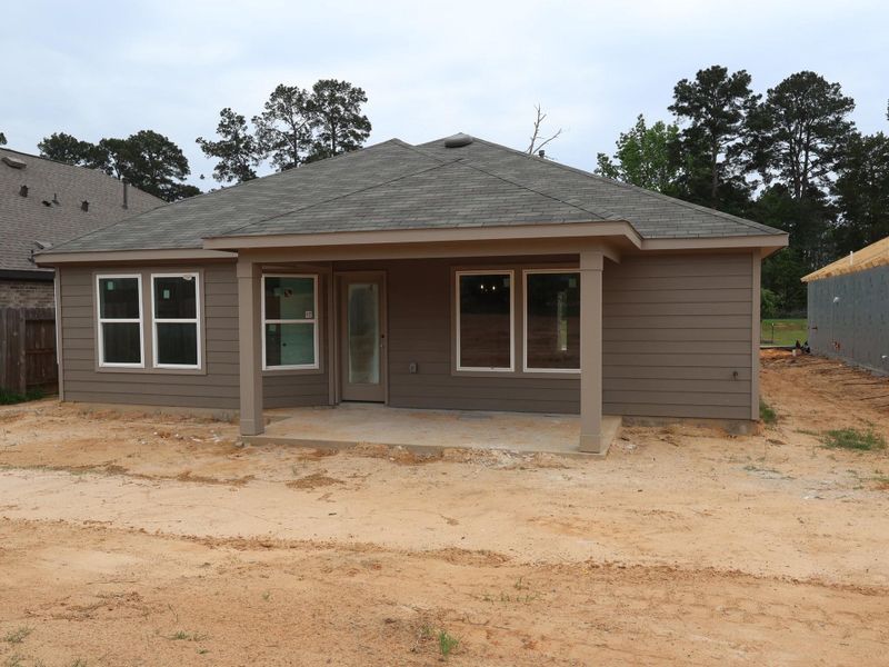 Exterior details and patio area of a home in Moran Ranch, Willis (Image 14).