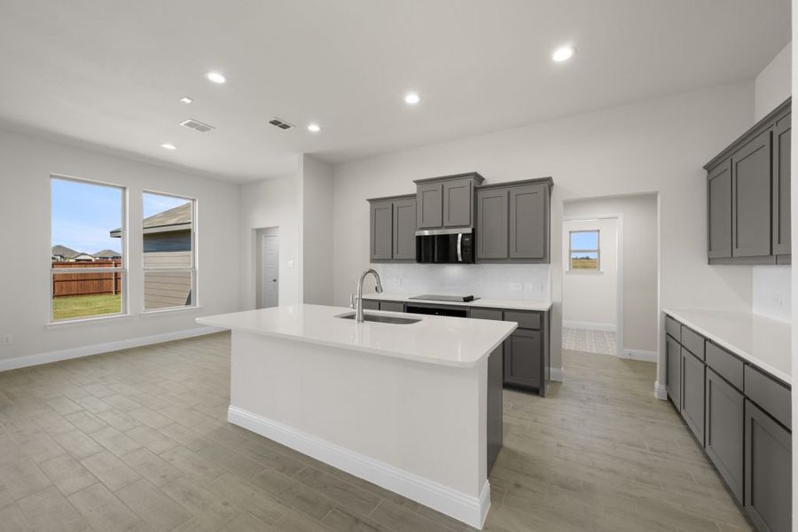 Front exterior of a new home in Still Water Lake, Godley, TX, highlighting curb appeal (Image 10). Front exterior of a new home in Still Water Lake, Godley, TX, highlighting curb appeal (Image 10).