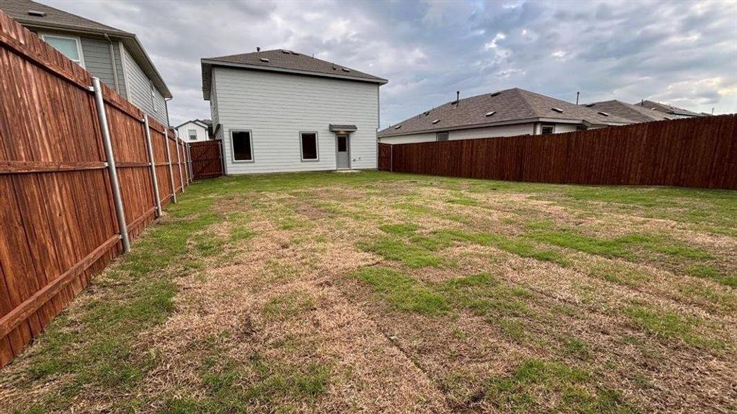 Exterior details and patio area of a home in Hickory Grove, Krum (Image 3).