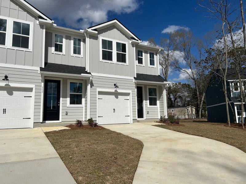 Front exterior of a new home in Windward Village, Summerville, SC, highlighting curb appeal (Image 12).