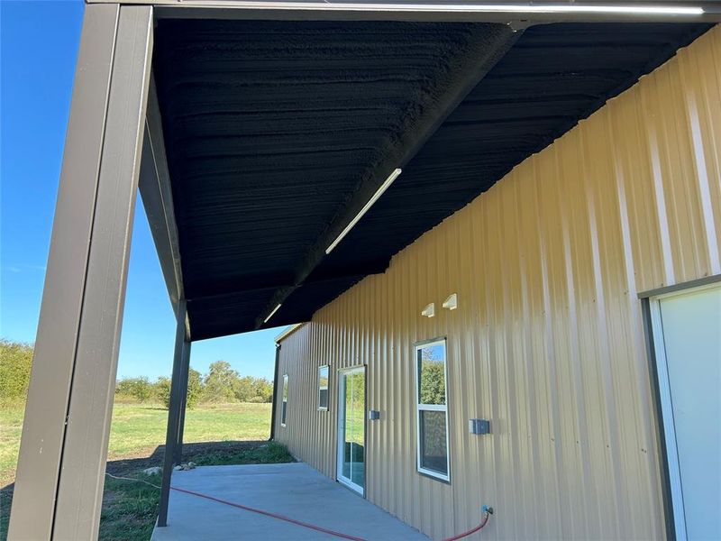 Exterior details and patio area of a home in , Blum (Image 1).