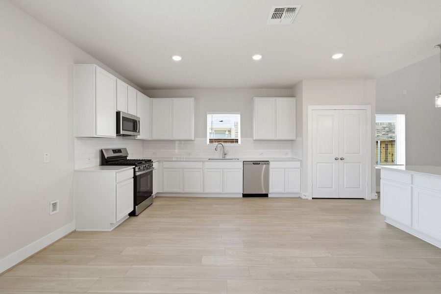 Furnished interior view inside a new home in Sunfield, Buda (Image 13).