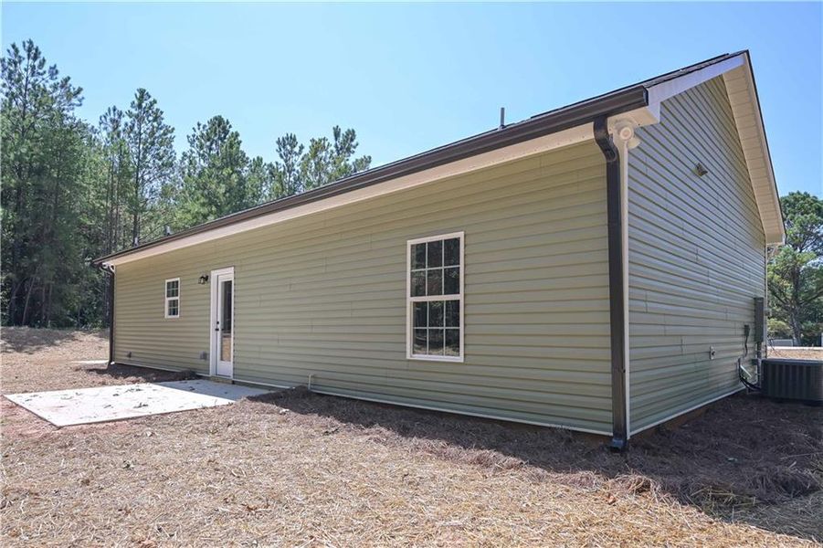 Front exterior of a new home in , Temple, GA, highlighting curb appeal (Image 17).