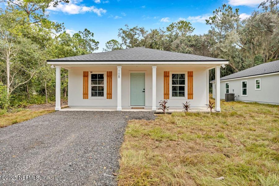 Front exterior of a new home in , East Palatka, FL, highlighting curb appeal (Image 1). Front exterior of a new home in , East Palatka, FL, highlighting curb appeal (Image 1).