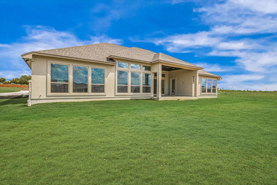 Exterior details and patio area of a home in Scofield Farms Estates, Georgetown (Image 24).