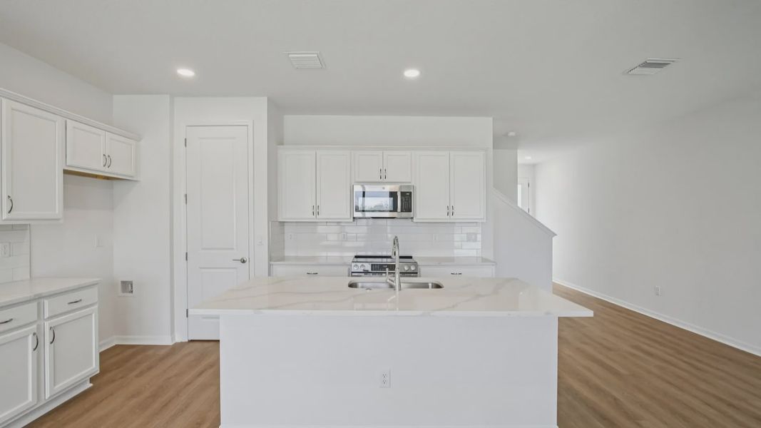 Furnished interior view inside a new home in Isla Mirada, San Antonio (Image 12).