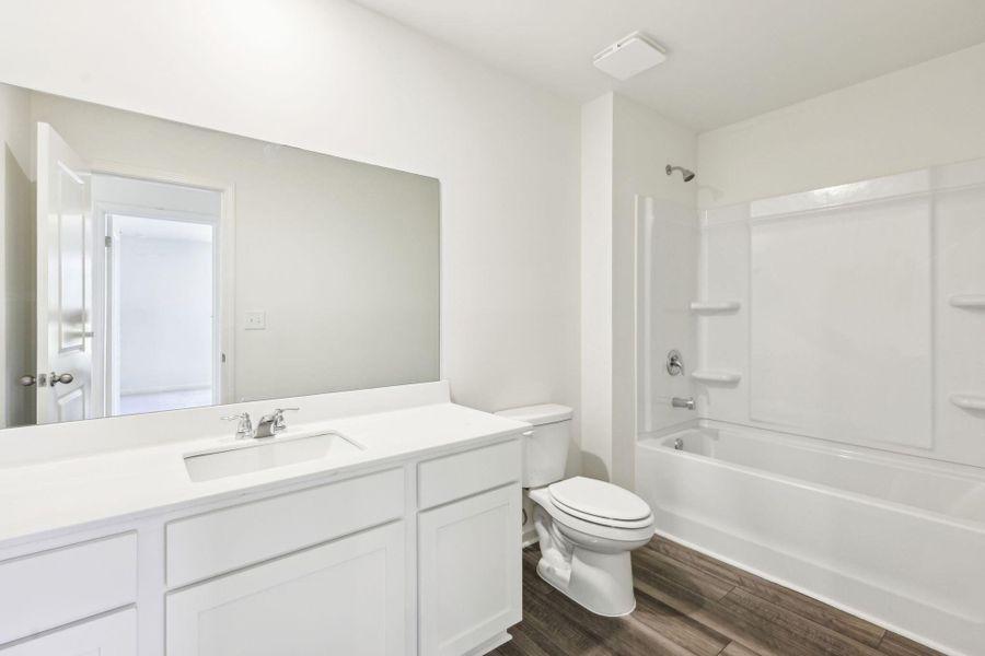 Furnished interior view inside a new home in Sunterra Lakes, Brookshire (Image 5).