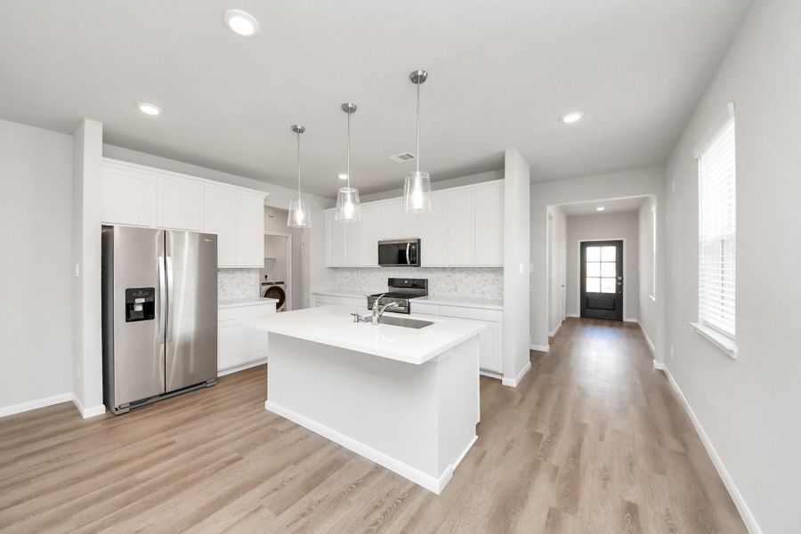 This home is still under construction. Photos shown are of a similar home with the same floor plan.