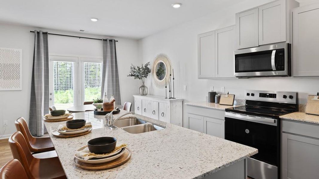 Furnished interior view inside a new home in Oaks at Cedar Grove, Fairburn (Image 22).