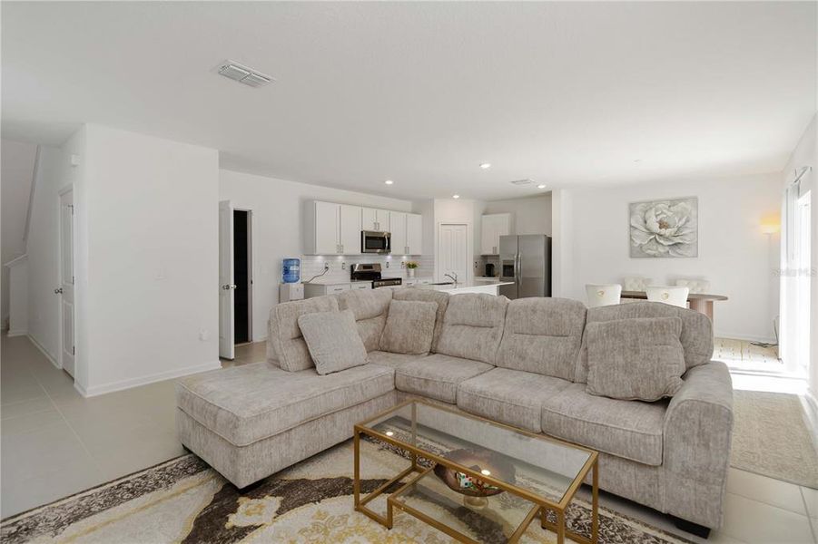 Furnished interior view inside a new home in Peace Creek Reserve: Manor Key Collection, Winter Haven (Image 9).