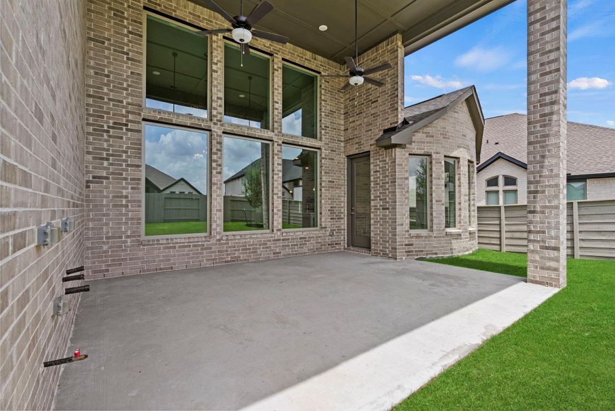 Exterior details and patio area of a home in Pomona, Manvel (Image 28).