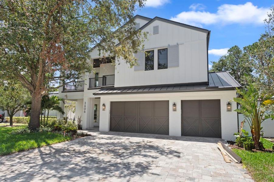 Front exterior of a new home in , Tampa, FL, highlighting curb appeal (Image 25). Front exterior of a new home in , Tampa, FL, highlighting curb appeal (Image 25).