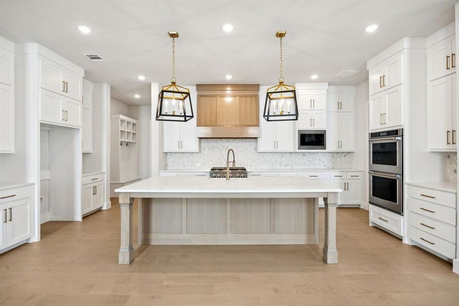 Beautiful cabinetry, gorgeous countertops and contemporary stainless appliances create a dream kitchen any chef would be proud to call their own!