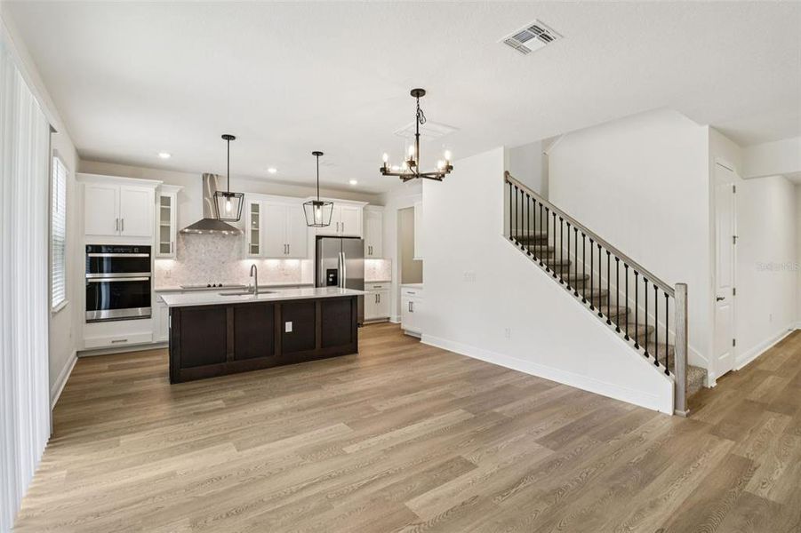 Furnished interior view inside a new home in Legends Preserve - Signature Series, Daytona Beach (Image 10).