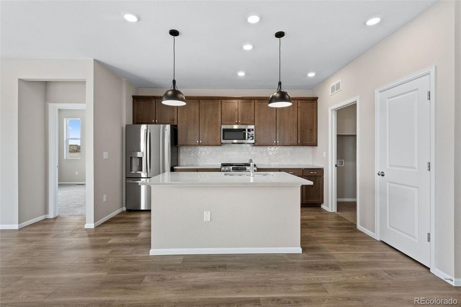 Furnished interior view inside a new home in The Cottages Collection at Ridgeline Vista, Brighton (Image 6).